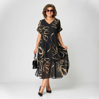 Francisca - Vestido con volante y estampado dorado