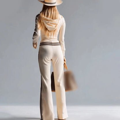 Lorena – Mono largo deportivo con capucha y cremallera