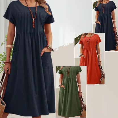 Irene - Vestido plisado con mangas cortas y bolsillos