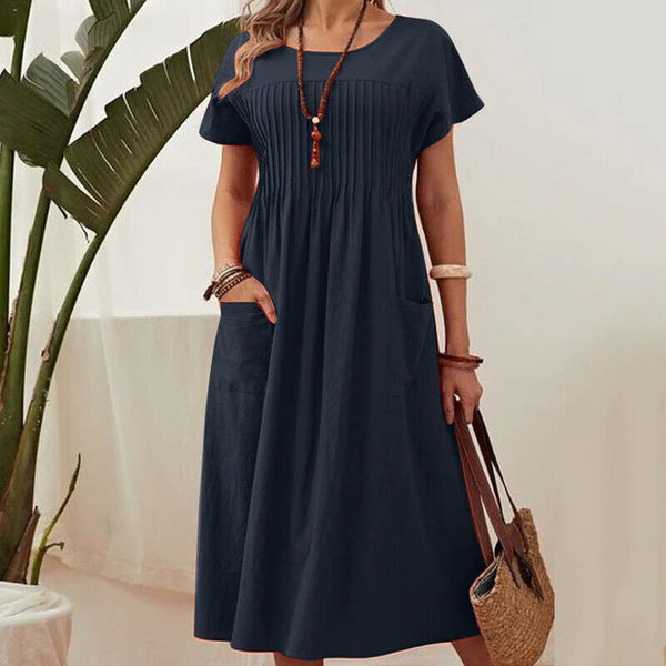 Irene - Vestido plisado con mangas cortas y bolsillos
