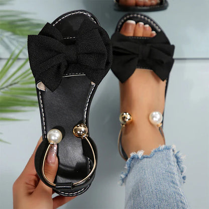 Liora - Sandalias de tiras elegantes con detalle de perla