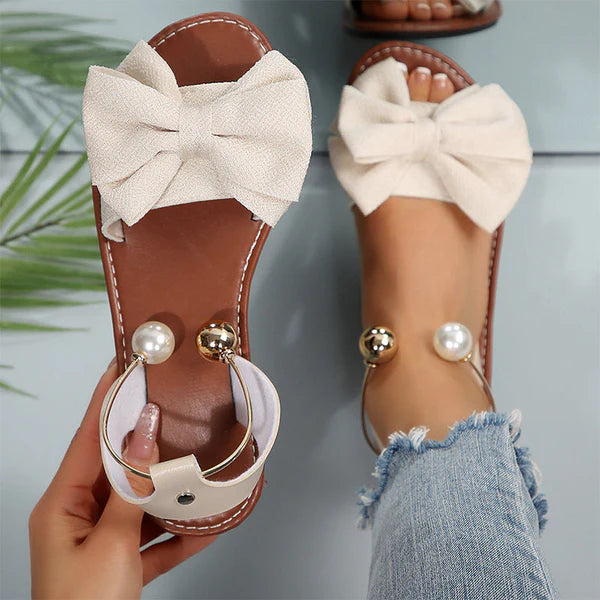 Liora - Sandalias de tiras elegantes con detalle de perla