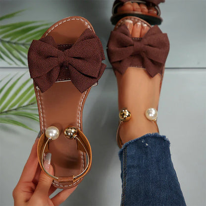 Liora - Sandalias de tiras elegantes con detalle de perla